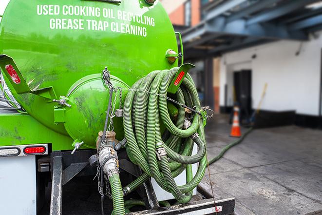 commercial kitchen grease trap receiving routine pumping in East Newark NJ